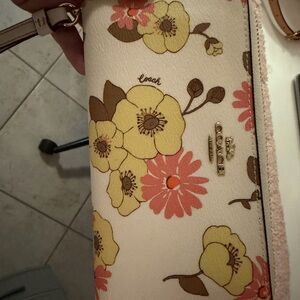 Coach Floral Clutch in Cream, Yellow, and Pink